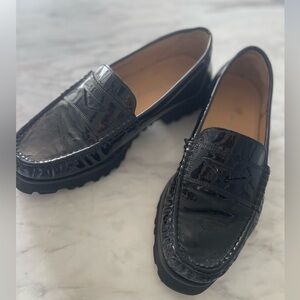 Ron White Black Patent-leather loafer with lug sole.